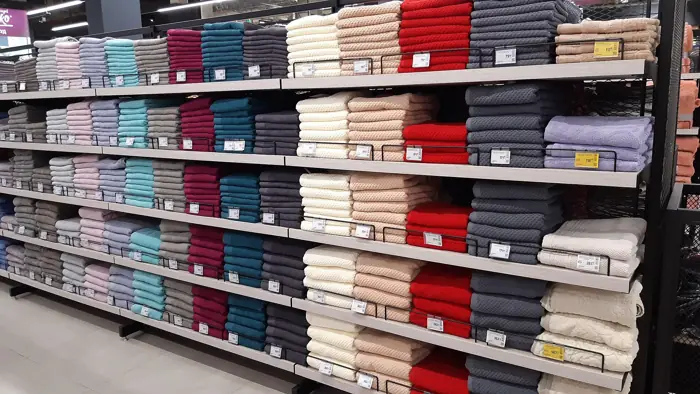 Clean towels folded on shelves